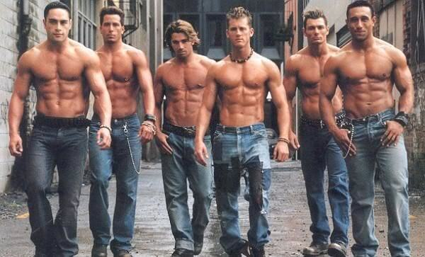 6 buff, shirtless men wearing jeans